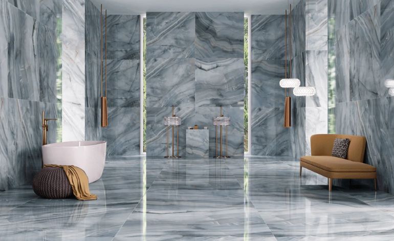 A luxurious bathroom featuring elegant marble walls and flooring, showcasing a sophisticated design in Miami, FL.